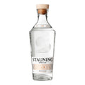 En klar glasflaske med Stauning Danish Dry Gin fra Stauning Whisky, med træprop, en moderne etiket i hvid og guld og et præget frontdesign.